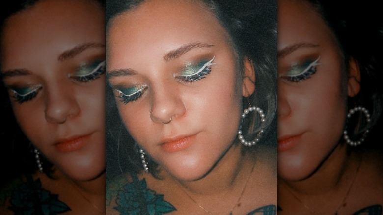 woman with fishtail eyeliner