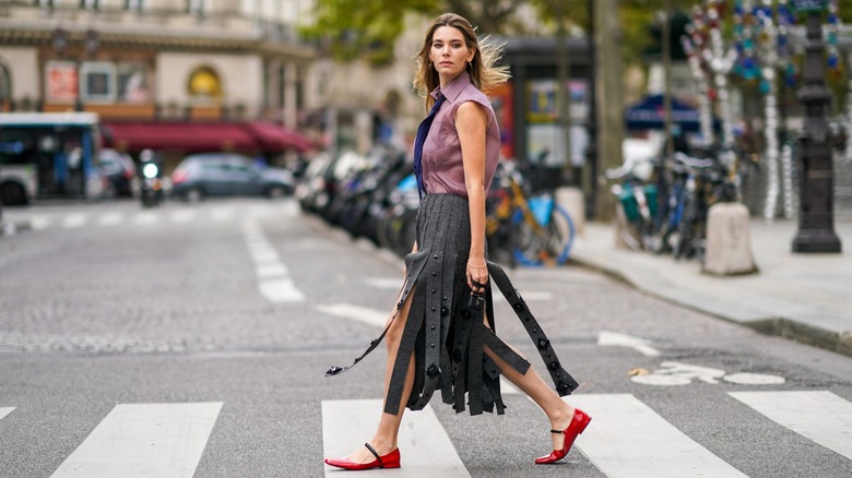 woman wearing red Mary Janes
