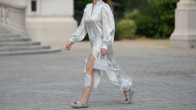 woman wearing suede Mary Janes