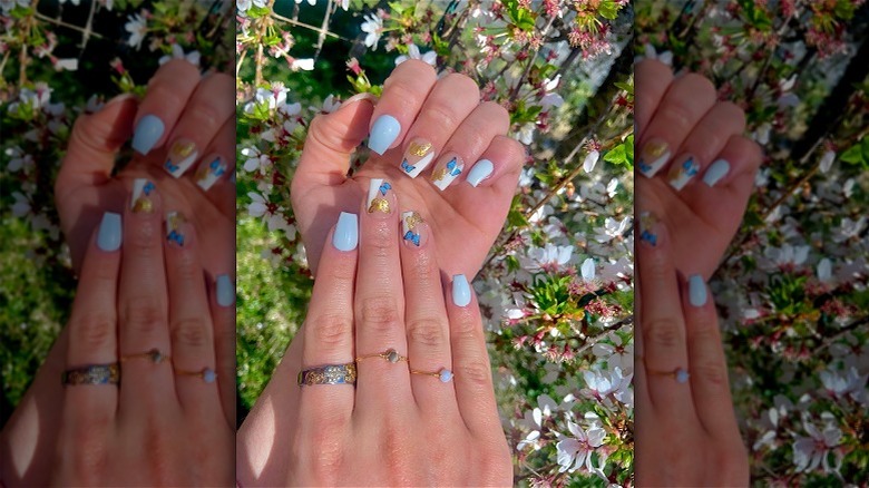 blue and gold butterfly nails