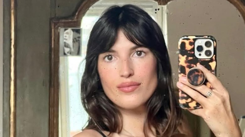 Jeanne Damas with curtain bangs