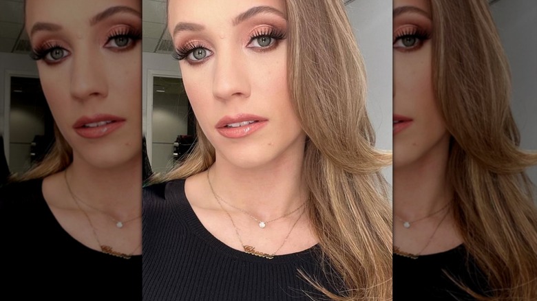 Kat Timpf taking a selfie without any glasses