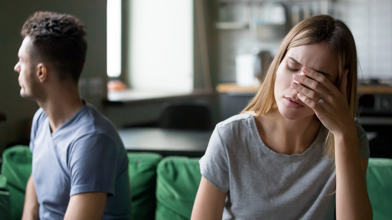 Frustrated woman with her husband
