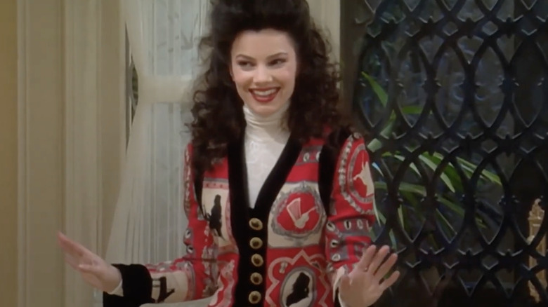 Fran Fine in a wool vest that depict animals silhouettes