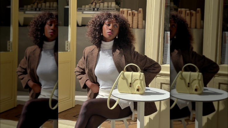 Woman with yellow handbag, Paris café