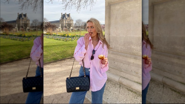 Woman wearing baby pink blouse