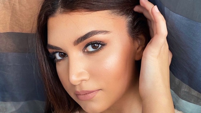 Girl with bronzed makeup look