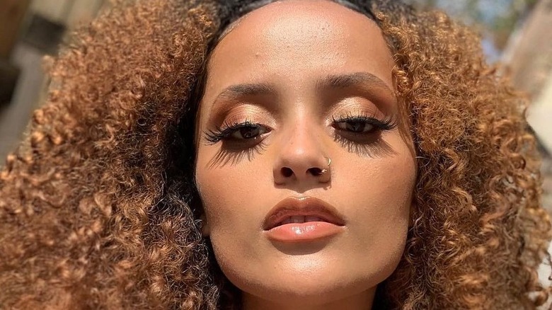 Girl wearing gold bronze makeup