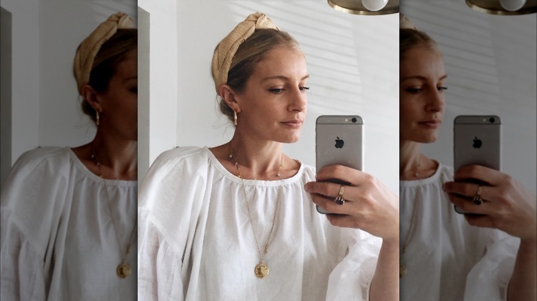 Woman wearing a raffia headband