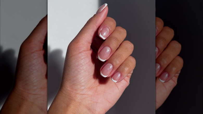 Short French tips sparkle manicure