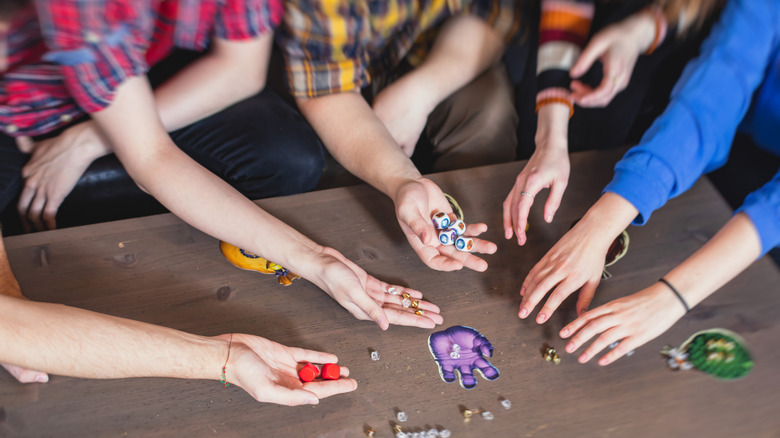 People playing board games together
