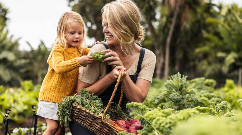 Mother and child gardening