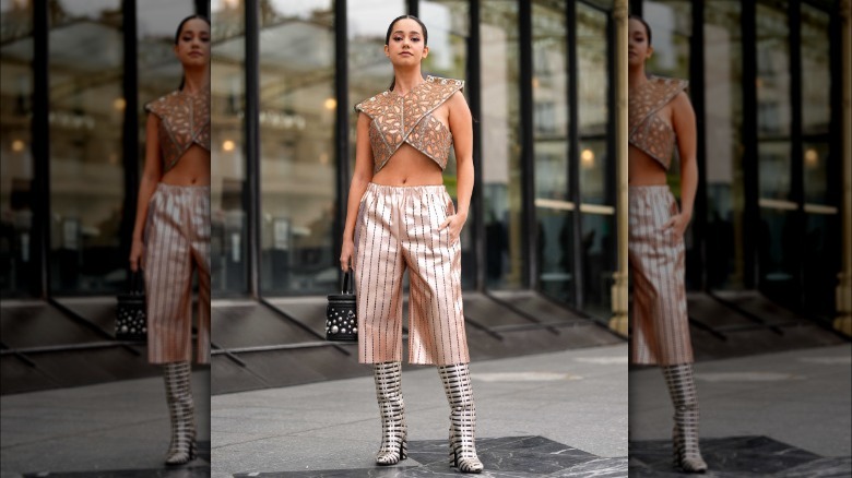 Lena Mahfouf in pink striped gauchos