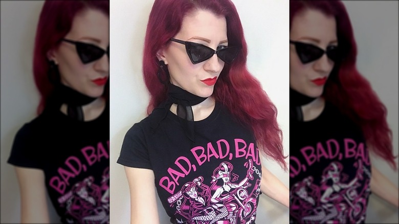 Woman wearing geometric sunglasses