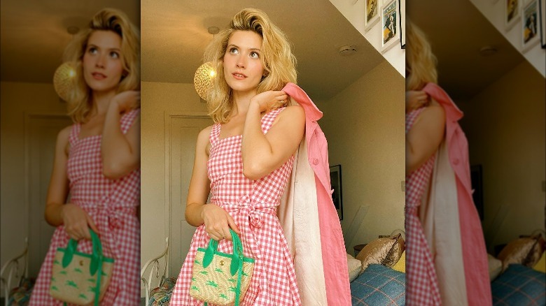Person in pink gingham dress