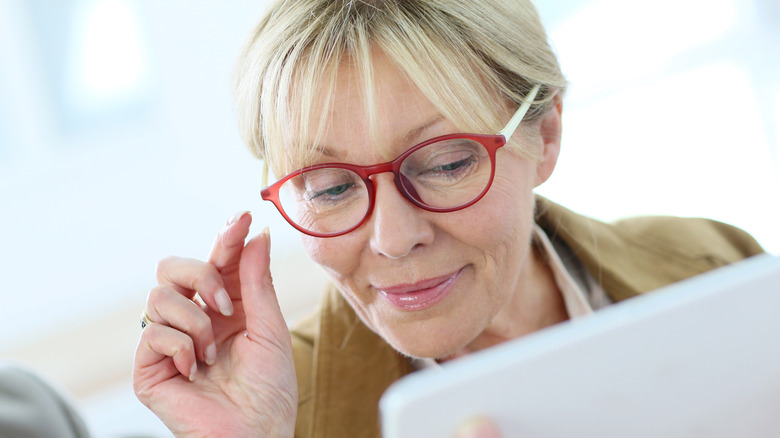 Woman wearing red glasses