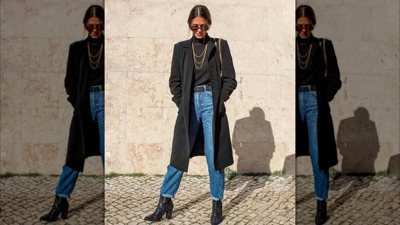 Girl wearing black sparkly boots