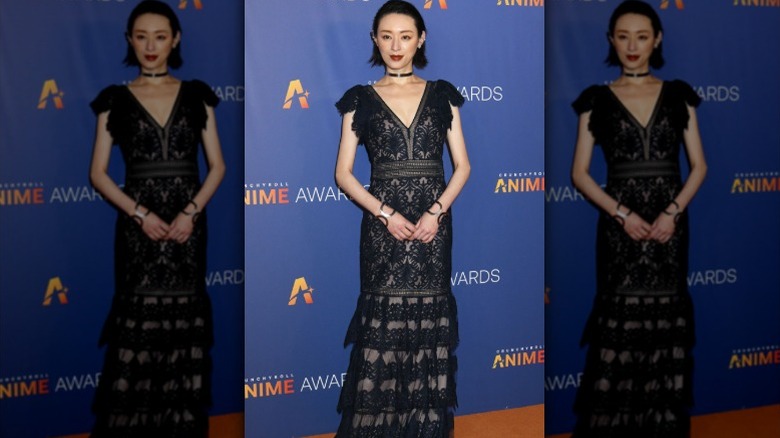 Chiaki Kuriyama poses on a red carpet in 2024
