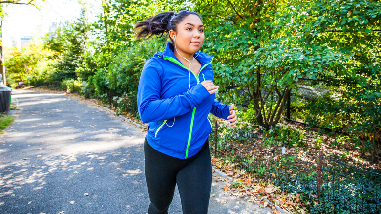 Woman running outside