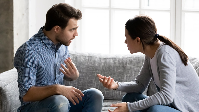 Man and woman fighting