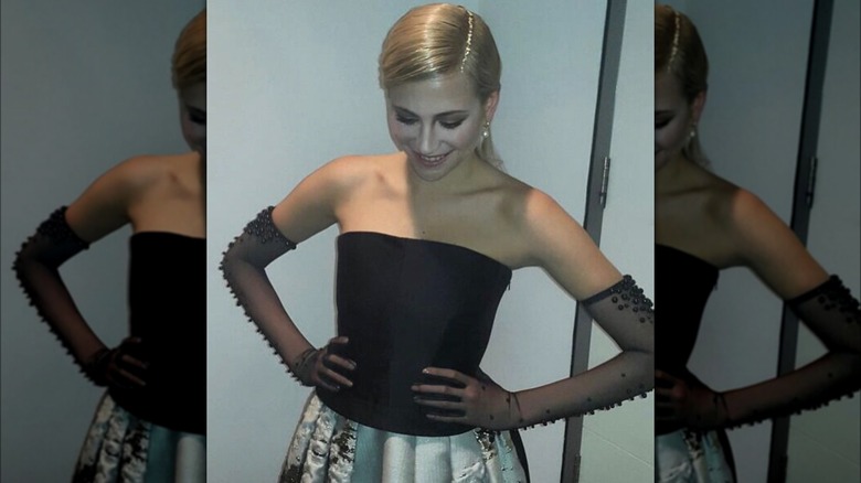 Woman with gold leaf in part