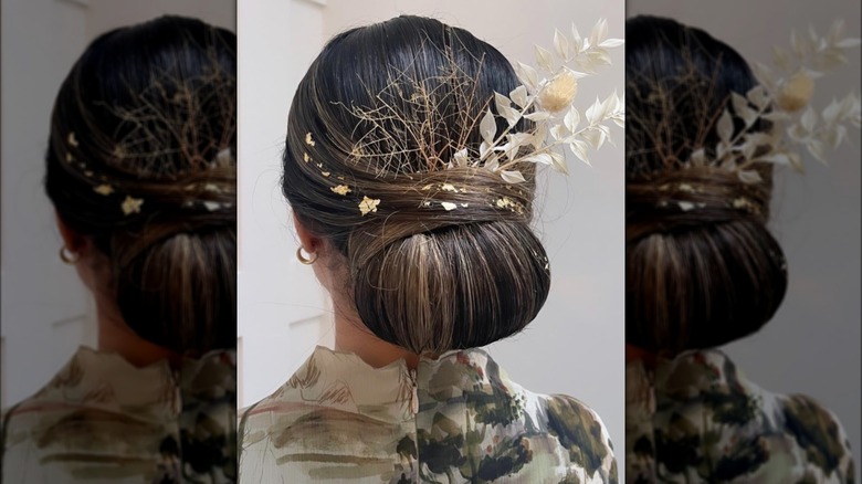 Gold leaf in a low bun