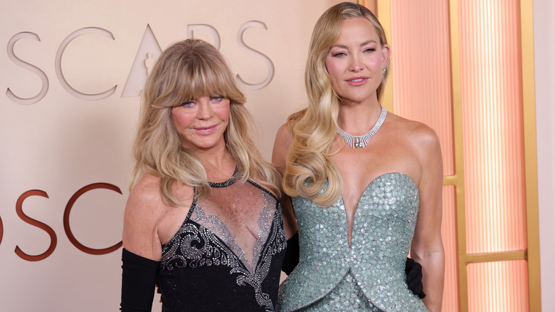 Goldie Hawn and Kate Hudson pose together at the 2026 Oscars