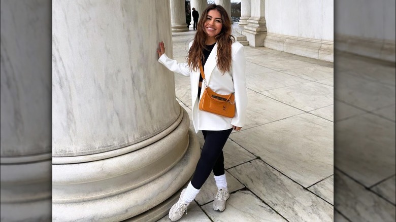 Woman in leggings with blazer