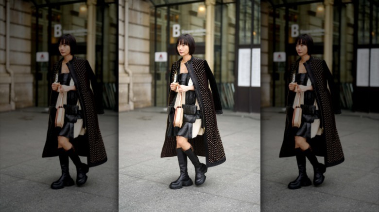 woman wearing studded coat