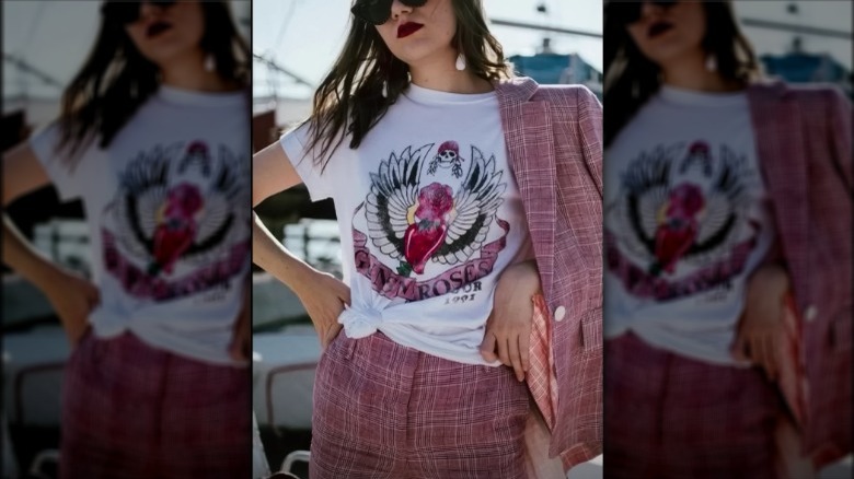 Woman wearing pink tweed outfit