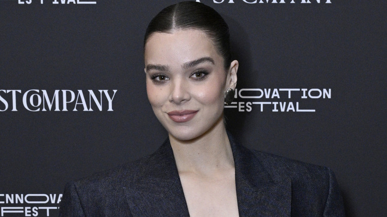 Hailee Steinfeld poses at an event