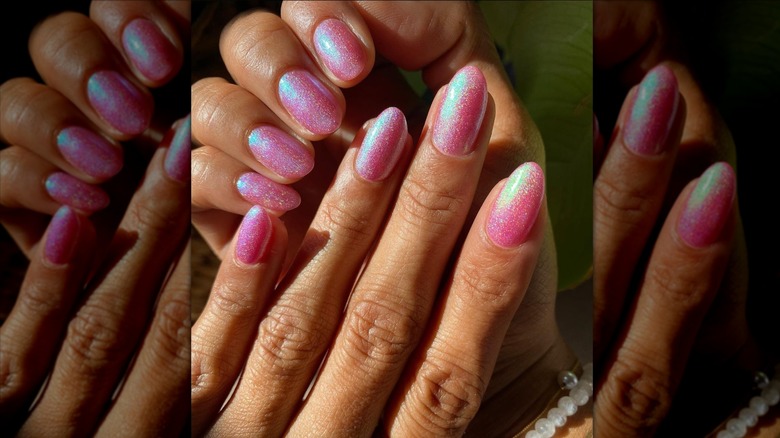 glittery pearl pink nails on hand