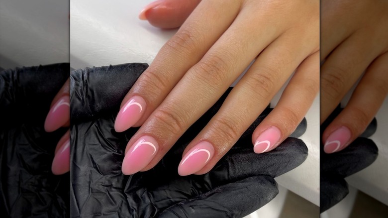 milky pink pearl nails on hand