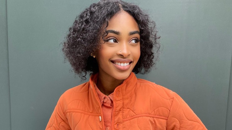 Woman with curly hair bob