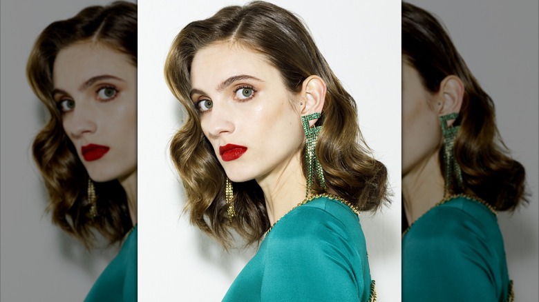 Woman with slicked side bangs