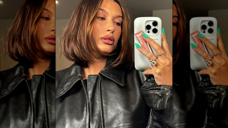 hailey Bieber with neon nails