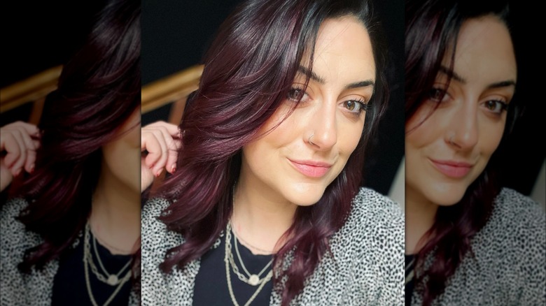 A woman with mulled wine hair