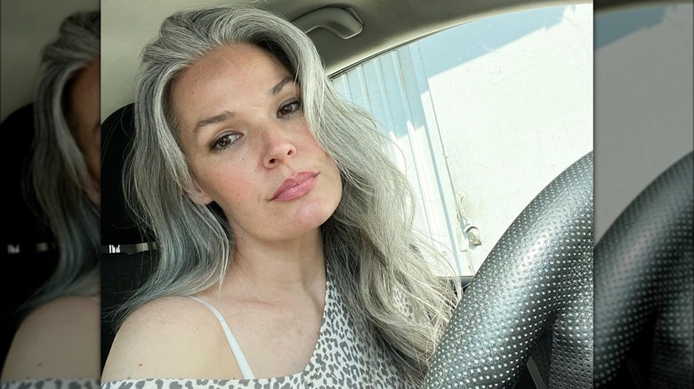 A woman with silver hair