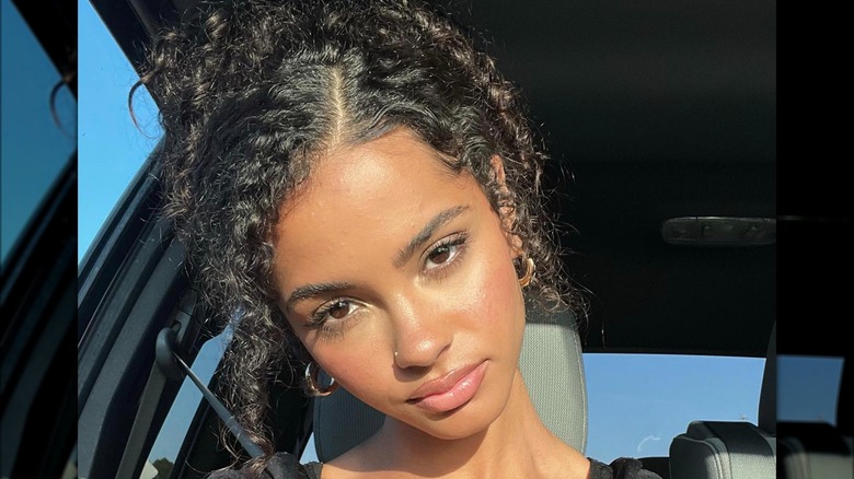 A woman with dark brown hair