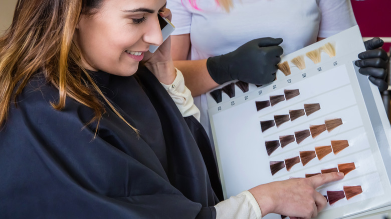 woman choosing her hair color