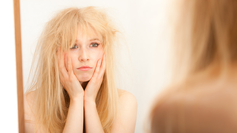 Woman with messy, frizzy hair
