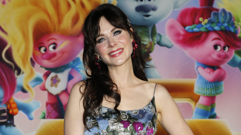 Zooey Deschanel curtain bangs hairstyle