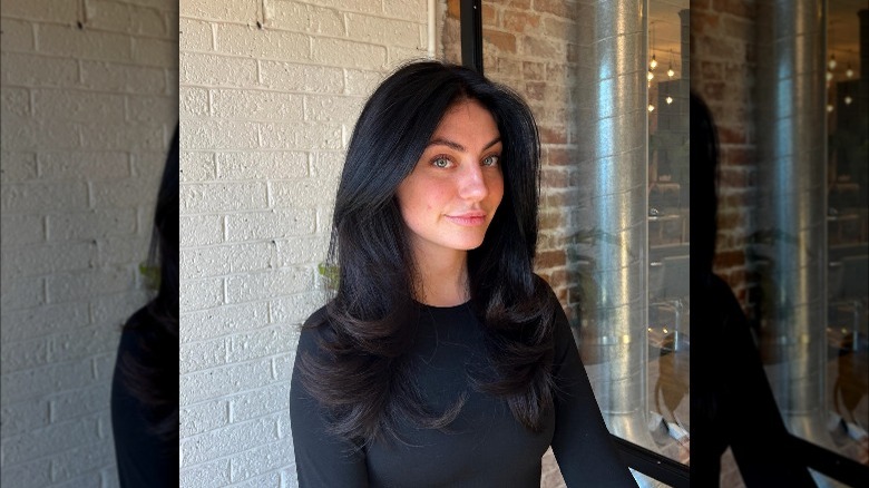 Woman with blowout hairstyle