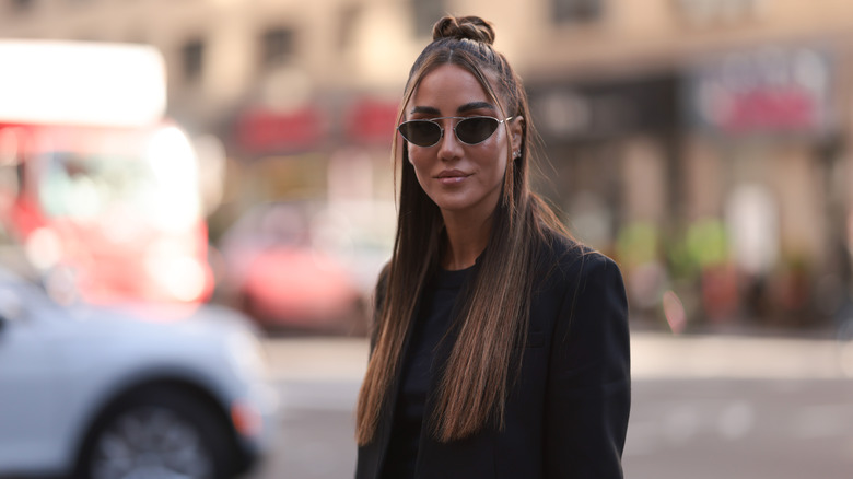 woman wearing hair half up