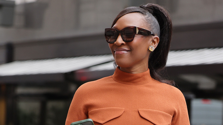 woman wearing sleek ponytail