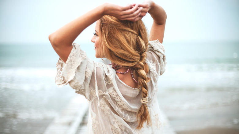 woman wearing messy braid