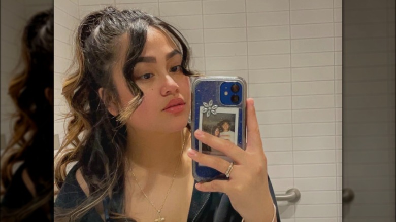 A half-updo and tendrils