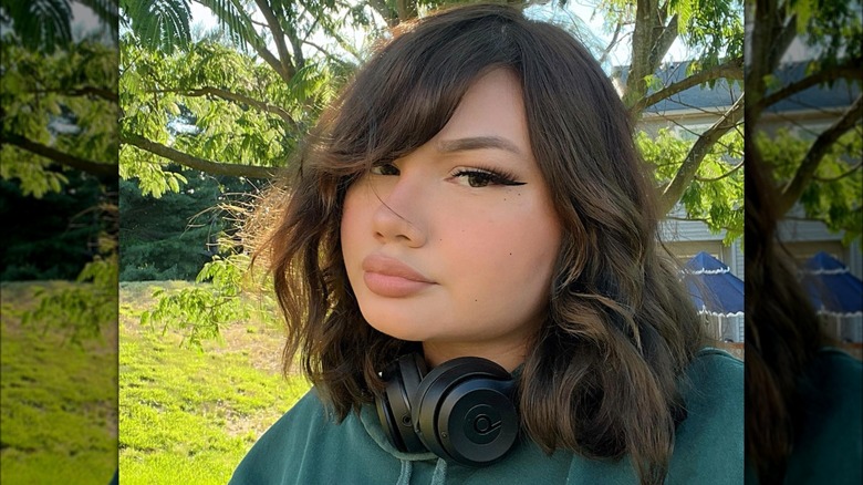 A woman with side bangs