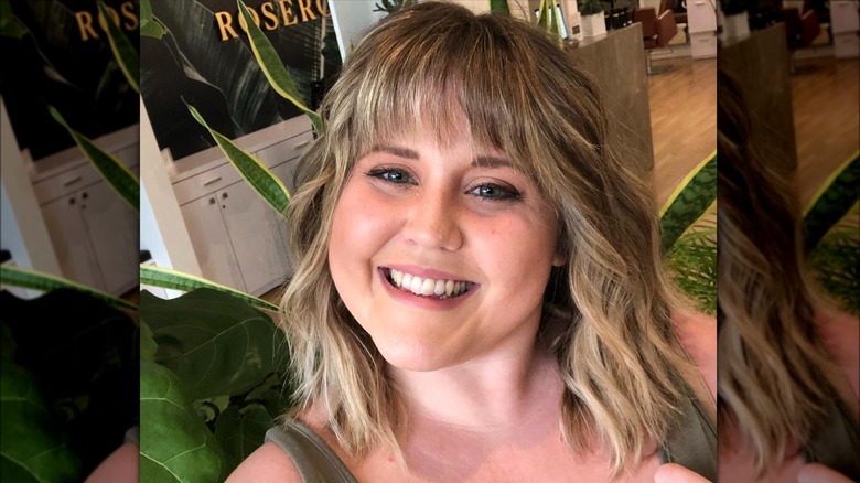 A woman with a wolf cut