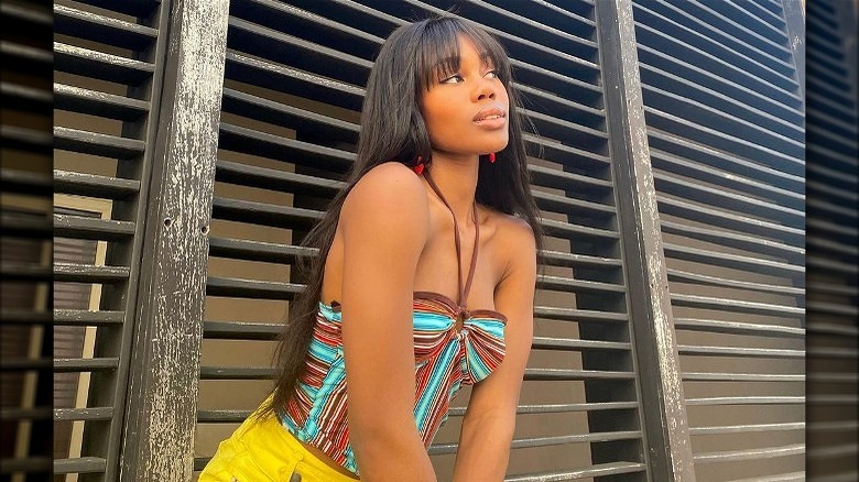 Long straight hair with blunt bangs